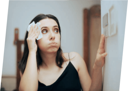 A woman wipes her eyes while gazing at a wall, reflecting a moment of contemplation and emotion. Paragon Service Pros.