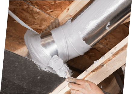 A technician from Paragon Service Pros uses a metal pipe to repair a leak, demonstrating skilled plumbing work.